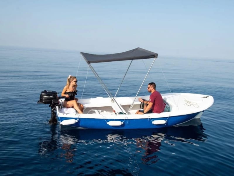 Pasara 5 HP no-licence self-drive boat rental in Dubrovnik — small open boat with bimini at Marina Frapa